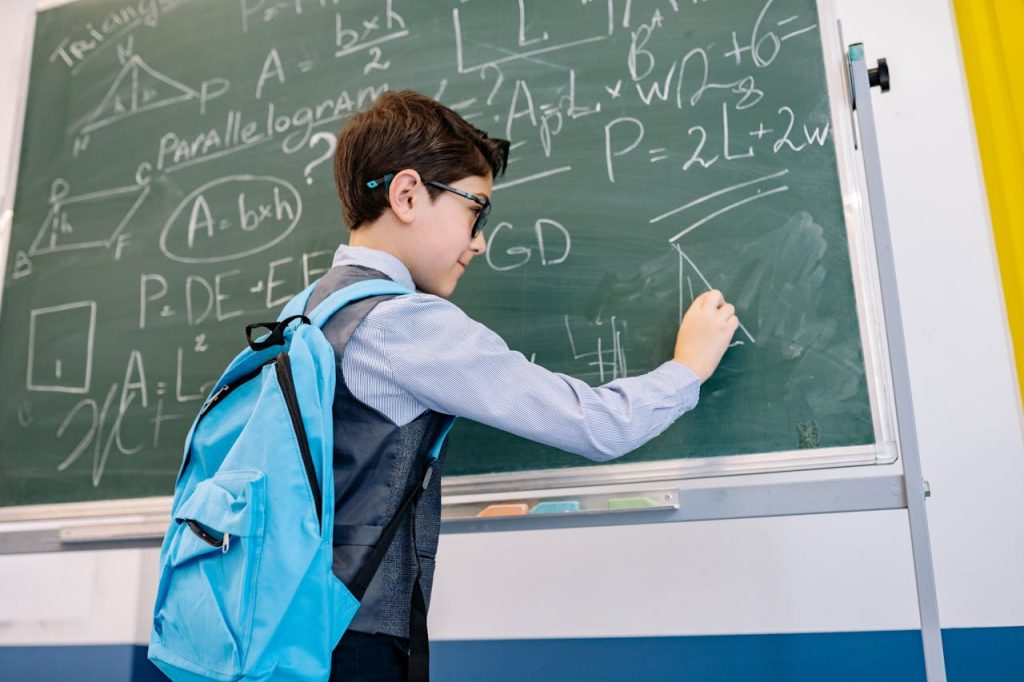Smart Boy Solving A Math Problem 8617634 1024x682